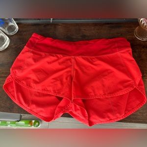Lululemon Run- speed up shorts size 6 red/orange color